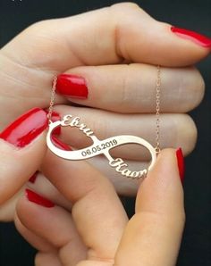 This 14K solid gold infinity name  and date necklace makes for a thoughtful and unique gift for a loved one . Whether you're celebrating a birthday , anniversary or just want to show your love , this neclace is sure to make a lasting impression. *FEATURES We are using real gold in our product for pendant and chain .  Material : 14 K Solid Gold  Colour : yellow gold   Charm dimentions : 3 cm x 1,5cm Chain Length : 14''-20'' upon your request  The open necklace laid straight & measured end to end. Personalized Infinity Rose Gold Jewelry, Customized Infinity Jewelry For Valentine's Day, Valentine's Day Infinity Jewelry With Custom Name, Personalized Rose Gold Infinity Jewelry, Personalized Infinity Jewelry, Infinity Necklace For Valentine's Day Personalized Gift, Custom Name Infinity Necklace For Valentine's Day, Elegant Custom Name Jewelry For Anniversary Gift, Infinity Necklace For Birthday Or Valentine's Day