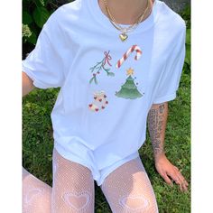 ♡ Please let me know if you need any custom designs or bulk orders that is not listed, I'll happily custom-make it for you! ♡ 🌟SIZING Please find the size chart in listing photo before purchasing. We recommended measuring a t-shirt you already own to get the best fitting t-shirt. 💖CARE/ WASH Machine wash: warm (max 40C or 105F); Non-chlorine: bleach as needed Tumble dry: medium heat; Iron, steam or dry: low heat; Do not dry clean. ✨SHIPPING Custom orders may take longer to process but your items usually will ship in 2-7 business days. Products shipped from US.  Thanks for shopping small.  Please let me know if you need any custom designs or bulk orders that is not listed, I'll happily custom-make it for you! ♡ Holiday White Graphic Tee Top, White Graphic Tee For Holiday, Holiday White Graphic Tee, White Holiday Graphic Tee, White Graphic Tee For Holidays, Casual White T-shirt For Holiday, White Holiday Top With Short Sleeves, White Short Sleeve Holiday Top, White Short Sleeve Top For Holiday