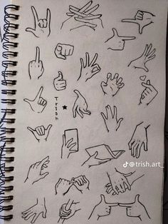 a notebook with drawings of hands and fingers