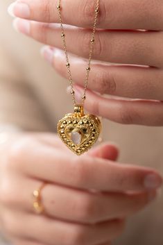 The Wishing Locket Collection is made up of beautiful handcrafted gold vermeil lockets, suspended on gold vermeil chains.  Each Wishing Locket can be filled with a personalised note - a wish, affirmation, vow, mantra, prayer or even a secret message from a loved one. Ever-present, the wearer holds the locket close to their heart. Choose from a selection of messages, or place something of your own in the locket of your choosing. We love the idea that putting a message out into the universe will h Gold Necklaces With Detachable Pendant For Keepsake, Gold Pendant Locket Necklace With Delicate Chain, Gold-plated Gold Locket Necklace Pendant, Gold-plated Pendant Locket Necklace, Gold Plated Gold Locket Pendant Necklace, Gold Heirloom Brass Locket Necklace, Gold Plated Pendant Locket Necklace, Heirloom Gold Brass Locket Necklace, Dainty Gold-plated Locket Necklace