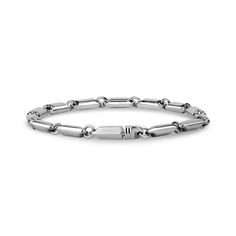 This solid link bracelet features full steel links 13mm x 5mm to create a modern yet timeless design. Perfect for stacking with other bracelets or wearing alone, its heavy weight ensures it stays securely in place. With simple yet sophisticated details, this bracelet will elevate any look. Modern Jubilee Bracelet With Chain Link, Classic Link Bracelets With Solid Link Construction, Modern Bracelets With Solid Chain Link Construction, Modern Solid Link Chain Bracelet, Modern Solid Chain Link Bracelet, Classic Cuban Link Metal Bracelet, Classic Metal Cuban Link Bracelet, Modern Jubilee Link Bracelet, Modern Bracelets With Box Chain And Chain Link