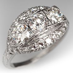 an art deco diamond ring with filigrees