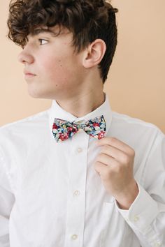 Our new pre-tied bow ties are the perfect accessory for any occasion. We offer two sizes which both have an adjustable neck strap to fit almost all ages. Each bow tie has a sturdy loop and clasp to ensure a snug and comfortable fit. Adult Sizing - The strap is adjustable to fit neck sizes from 11.5" - 20". This size should fit most teens/adults from 13 years and up. The bow is approx. 4.75" in length and 2.3" in height. Kid Sizing - The strap is adjustable to fit neck sizes from 9" - 15.5". This Colorful Bow Tie, Blue Floral Bow Tie, Formal Pre-tied Bow Tie With Butterfly Knot, Floral Bow Tie, Kids Bow Ties, Pre Tied Bow Tie, Cool Ties, Gender Envy, Neck Strap