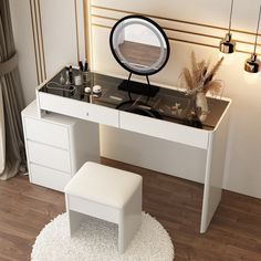 a white vanity table with a mirror and stool in front of it on top of a hard wood floor