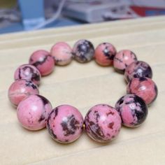 Material:pink rhodonite beads  size :Approx 16mm   quantity: one strand  6mm approx 29 pcs one strands 7mm approx25 pcs one strands 8mm approx 22 pcs one strands 9mm approx 21pcs one strands 10mm approx 19 pcs one strands 11mm approx 18pcs one strands 12mm approx 16 pcs one strands 13mm approx 16 pcs one strands 14mm approx 15 pcs one strands 15mm approx 14pcs one strands 16mm approx 14 pcs one strands 17mm approx 13pcs one strands 18mm approx 13pcs one strands 19mm approx 12pcs one strands 20mm Beautiful Beaded Bracelet, Rare Gifts, Unique Jewelry Gifts, Jewelry Gifts, Beaded Necklace, Beaded Bracelets, Beads, Pink, Handmade Gifts