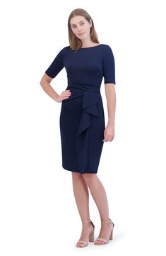 This sophisticated desk-to-dinner dress is designed with a tucked waistline and a luscious ruffle cascading down the skirt. 40 1/2" length ( size 8) Bateau neck Elbow-length sleeves 95% polyester, 5% spandex Hand wash, dry flat Imported Elegant Midi Dress With Ruffle Hem And Fitted Bodice, Formal Midi Dress With Ruffle Hem And Fitted Bodice, Chic Ruffled Elastane Dress, Formal Ruched Dress With Fitted Waist, Chic Fitted Ruffle Dress For Formal Occasions, Elegant Fitted Ruffle Dress, Elegant Fitted Ruffle Dress For Cocktail, Elegant Ruched Ruffle Evening Dress, Fitted Midi Dress With Ruffle Hem For Work