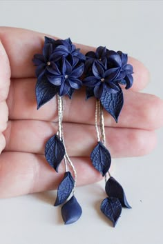 Pair of Hand Sculpted dark blue flowers Earrings. Polymer clay  Long dangle earrings. قلادات متدلية, Dark Blue Flowers, Flowers Earrings, Quilled Creations, Blue Lily, Lily Flowers, Earrings Polymer Clay, Long Dangle Earrings, Fancy Jewelry