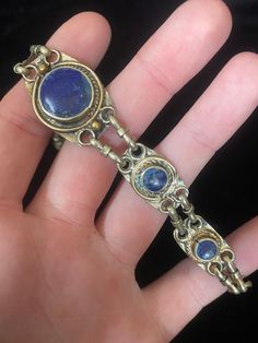 Beautiful antique silver bracelet with blue stones. I'm not certain that this is from the late 1800's, but I'm pretty sure (cant guarantee it). Has some green from oxidation over time. Fully functional with a hook and loop closure Blue Stones, A Hook, Dec 1, Hook And Loop, Antique Victorian, Blue Stone, Chain Link Bracelet, Link Bracelets, Chain Link