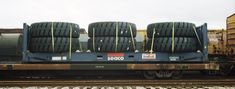 the back of a train car with tires on it