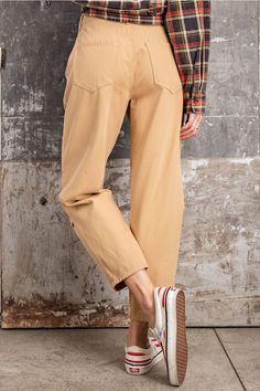 Old-school straight-leg pants cut that hit at the high waist with an easy fit through the hips. -Color: Khaki -Front/ Back pockets -Loose fit -Button and zip fly -No stretch -Content: 100% Cotton -Imported -Inseam 26" Small (0-4) Medium (4-8) Large (8-12) Straight Fit Solid Bottoms With Pockets, Solid Straight Fit Bottoms With Pockets, Solid Bottoms With Pockets And Straight Fit, Trendy Relaxed Fit Tapered Leg Cargo Pants, Casual Straight Fit Wide Leg Work Pants, Casual Wide Leg Work Pants Straight Fit, Casual Wide Leg Pants With Button Closure, Full Length, Casual Wide-leg Work Pants With Straight Fit, Trendy Wide Leg Pants For Everyday Fall Wear