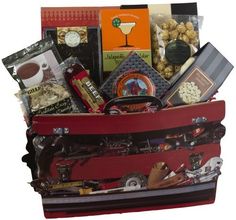 a red suitcase filled with lots of food and drinks on top of a white background