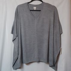 A New Day Heather Gray V-Neck Pull Over Lightweight Sweater Poncho. Osfm ( One Size Fit Most) Nwt Measurements Approximate. Armpit To Armpit 57" Top To Bottom 31" 100% Acrylic Pull Over Sweater, Sweater Poncho, Poncho Sweater, Shrug Sweater, Lightweight Sweater, Light Weight Sweater, A New Day, Heather Gray, New Day