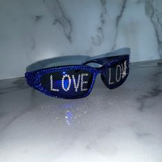 Love Crystal Sunglasses, Mirror lens Wrap Around Space Style, Hand Covered with High Quality, Brilliant Sparkling Crystals. Personalized with the word LOVE on each lens in silver clear diamond crystals.  These on trend, italian style sunglasses come in many color options. Pleases see listing picture and variations at check out to select the color of your choice. Further personalization:  I can personalize the lens with initials, frat or sorority names, numbers, symbols or short words. Message me Silver Sweet 16, Diamond Sunglasses, Rave Fit, Bling Sunglasses, Sorority Names, Sunglasses Mirror, Crystal Sunglasses, Numbers Symbols, Unique Gift Items