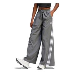 Adidas Sporty Sweatpants For Spring, Sporty Adidas Logo Pants, Adidas Sportswear Pants For Spring, Adidas Sporty Relaxed Fit Pants, Adidas Relaxed Fit Pants, Adidas Relaxed Fit Pants With Logo, Relaxed Fit Striped Bottoms For Spring, Adidas Sporty Wide Leg Sweatpants, Gray Wide Leg Sportswear Pants