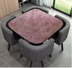 a dining table with chairs around it