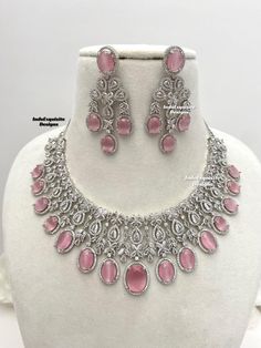 American Diamond Necklace Set/CZ Necklace/ Reception Jewelry/Statement Necklace Set/silver pink All items are shipped from Brampton, Ontario, Canada. If you need your item by a certain day, please reach out to us for express delivery option before placing the order so that we can update the shipping for you. Standard shipping/delivery timeline Below are the delivery timeline estimates once the order is shipped. ---> USA delivery timeline * 3-6 business days to major urban centers in USA. It may Silver Necklace With Sparkling Stones For Reception, Dazzling Silver Bridal Necklace With Stone Setting, Silver Wedding Necklaces With Stones, Pink Round Necklace For Party, Elegant Pink Necklace For Reception, Silver Diamond Bridal Necklace With Stones, Dazzling Silver Necklace For Reception, Pink Crystal Jewelry With Diamond Accents, Hand Set Pink Necklace For Celebrations