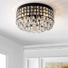 a chandelier hanging from the ceiling in a room