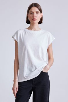 100% Cotton Made in India Crew neckline, cap sleeve Machine wash cold on gentle cycle with like colors, lay flat to air dry Fits true to size. Select your usual size Model is 5'10" and wearing a size small Sweater Knit Skirt, Swim Brands, Cat Pajamas, Apiece Apart, Ag Jeans, Dress Pant, Knit Skirt, Knit Jacket, Cap Sleeve