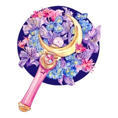 a drawing of a crescent and flowers on a blue plate with a gold key in the middle