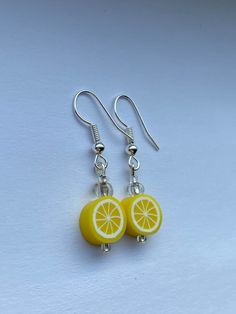 Super cute and fun summer earrings! These include a light weight clay bead and all earrings are made with a stainless steel hypoallergenic wire! Yellow Polymer Clay Earrings With Ear Wire, Playful Hypoallergenic Summer Jewelry, Fun Polymer Clay Drop Earrings, Casual Hypoallergenic Yellow Jewelry, Casual Yellow Hypoallergenic Jewelry, Nickel Free Beaded Earrings Summer Gift, Handmade Novelty Earrings For Everyday, Cute Nickel-free Yellow Earrings, Cute Yellow Nickel-free Earrings