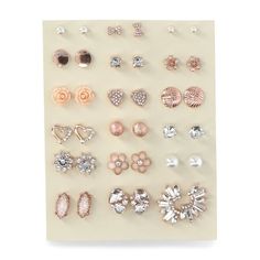 A little sparkle and a lot of fun, No Boundaries Rose Gold-Tone 18-Pack of Stud Earrings is the best way to stock up in style. Each pair features a mixture of stunning designed adorned with sparkling crystals, adding a touch of glamour to any outfit. Perfect for mixing and matching, this versatile set lets you express your unique style every day. Whether youre dressing up for a night out or adding a little bit of sparkle to your daily look, these earrings are your new go-to favorites. Only at Walmart. Size: one size.  Color: Pink.  Gender: female.  Age Group: adult.  Pattern: floral. Cheap Romantic Pink Earrings, Affordable Pink Rose Design Earrings, Pink Crystal Bridal Earrings For Party, Affordable Pink Crystal Metal Earrings, Pink Hypoallergenic Dangle Crystal Earrings, No Boundaries, Sparkling Crystal, Pattern Floral, Daily Look