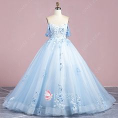 Lace Quinceanera Dress For Sweet 16 During Prom Season, Blue Tulle Quinceanera Dress, Light Blue Tulle Ball Gown For Debutante Ball, Sweetheart Neckline Organza Quinceanera Dress For Prom Season, Blue Organza Ball Gown For Quinceanera, Light Blue Tulle Gown For Quinceanera, Floral Applique Ball Gown For Debutante Ball, Floral Applique Ball Gown For Prom Season, Floral Applique Ball Gown For Quinceanera Or Prom