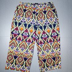 Travel Elements Colorful Print Slinky Stretchy Wide Leg No Wrinkle Pants Plus 2x. Condition Is New With Tags Stretch Multicolor Print Bottoms For Spring, Spring Stretch Multicolor Print Bottoms, Spring Multicolor Stretch Bottoms, Casual Stretch Bottoms In Multicolor Print, Casual Stretch Bottoms With Multicolor Print, Casual Stretch Multicolor Print Bottoms, Casual Multicolor Print Stretch Bottoms, Multicolor Stretch Casual Bottoms, Casual Patterned Bottoms With Vibrant Print