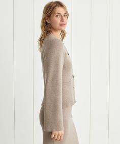 Cooper Cardigan Taupe Featuring a structured hourglass silhouette and a very slight bell sleeve, this chic knit is unlike anything we’ve done before. Ultra-soft wool cashmere and a classic shape are easily styled with everything from wide-leg trousers to your favorite skirt. 70% wool, 30% cashmere. Made in China of Peruvian yarn. Fitted button-down cardigan. Modern Wool Long Sleeve Cardigan, Elegant Fitted Button-up Cardigan, Elegant Cashmere V-neck Outerwear, Elegant V-neck Cashmere Outerwear, Elegant Fall Cardigan For Workwear, Elegant Fall Cardigan For Work, Elegant Fall Workwear Cardigan, Fitted Cashmere Outerwear With Button Cuffs, Chic Wool Cardigan With Button Closure