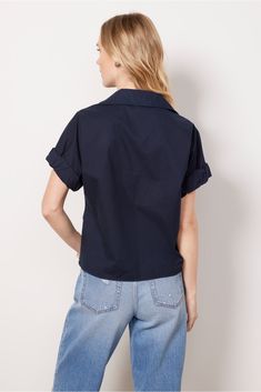 A twist-front hem adds a stylish touch to this cotton button-down by Stateside, featuring a relaxed fit, slightly cropped length, and rolled short sleeves. Add it to your warm-weather rotation with jeans, shorts, or cargo pants. | STATESIDE Women's Voile Twist Front Shirt, Size Small, Blue Effortless Collared Shirt With Rolled Sleeves, Spring Tops With Rolled Sleeves And Camp Collar, Effortless Collared Top With Rolled Sleeves, Spring Camp Collar Tops With Rolled Sleeves, Spring Short Sleeve Shirt With Rolled Sleeves For Work, Casual Cotton Blouse With Spread Collar, Everyday Summer Tops With Cuffed Sleeves, Relaxed Fit Rolled Sleeves Short Sleeve Shirt For Work, Summer Tops With Cuffed Sleeves For Everyday