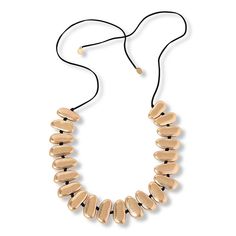 MarlaWynne Oval Bead Station Necklace Natural forms seem to inspire the beads that adorn this modern cord necklace.  Discover a simply intriguing statement style that's great solo and layered with other necklaces.       Approx. 55-3/16"L x 1/8"W; fits 29" to 48-7/8"     Worn finish (Goldtone, Silvertone); rubber finish (Black)      Black cord necklace with adjustable slide closure Adjustable Gold Necklace With Oval Beads, Gold Adjustable Necklace With Oval Beads, Modern Adjustable Single Strand Necklace, Black Cord Necklace, Station Necklace, Natural Forms, Cord Necklace, Long Necklace, Fashion Statement