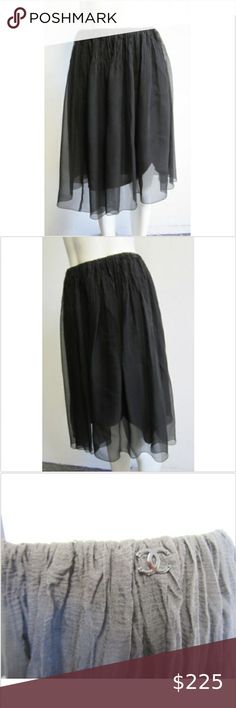 CHANEL silk crepe black ruched full skirt sz 40/ 8 CHANEL 06A 100% silk crepe black ruched full skirt sz 40/ 8  Black skirt has the Chanel double 'C' logo on the hip, ruching around the waist, skirt has 2 layers- the top one is sheer, back zip closure.  Material   100% silk     Condition   Very good   APPROX MEASUREMENT  Displayed Size   Fr 40/ US 8     Waist   30''     Total Length   22'' CHANEL Skirts A-Line or Full Chanel Skirt, Chanel Black, Silk Crepe, Black Skirt, Full Skirt, Waist Skirt, Ballet Skirt, Womens Skirt, A Line