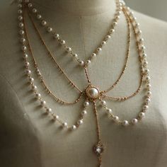 A necklace that will add splendor to the ladies of royalty and aristocrats. Glittering pearls and golden chains unleash a glorious beauty. The time has come for the bell to sound, inviting you to sleep. Let's wear a sparkling necklace and go out to the court ball tonight. 
 
 
 
 
 
 
 
 
 ＜Material ＞ 
 
 Alloy Luxury Necklace For Opera, Elegant Pearl Chain Necklace For Party, Elegant Metal Beaded Necklaces For Party, Pearl Chain Necklace For Party, Elegant Beaded Metal Necklace For Parties, Gold Pearl Chain Jewelry For Party, Gold Chain Necklace With Pearl Pendant For Party, Party Gold Chain Necklace With Pearl Pendant, Party Gold Jewelry With Pearl Chain