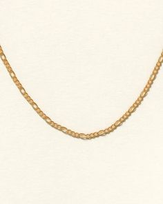 Our Gianna chain is as classic as the Italian chain gets. One of the most popular chains in our collection, she's perfect for layering with multiple necklaces for a sophisticated look. She's tarnish-resistant, showerproof, and gentle on the skin so you can wear her wherever your heart desires. …………………………………. D E T A I L S • Chain length comes in three lengths: measures 16, 18, or 20 inches • Chain thickness measures 1.5 mm • Spring clasp • 100% 18k Gold Filled • Tarnish-resistant, waterproof, sa Elegant Figaro Chain Necklace For Layering, Classic Double Strand Delicate Chain Necklace, Dainty Double Chain Link Necklace, Trendy Figaro Chain Link Necklace, Multiple Necklaces, Italian Chain, Figaro Chain Necklace, Shes Perfect, Soft Toothbrush