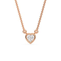 This rose gold Heart Solitaire Diamond Necklace made with a heart cut diamond in bezel setting with adjustable chain in top view Solitaire Diamond Necklace, Fancy Color Diamond Ring, Colored Diamond Rings, Halo Necklace, Solitaire Necklace, Diamond Solitaire Necklace, Halo Earrings, Halo Earrings Studs, Heart Diamond