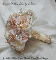 a bridal bouquet with pearls and flowers on white satin fabric, ready to be used as a bride's bouquet