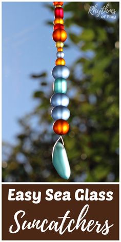 an easy sea glass suncather hanging from a tree with the words easy sea glass sun catchers on it