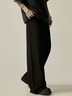 These Multi-Button High-Waisted Wide-Leg Trousers offer a sleek and stylish look with their high waist and wide-leg design. The multiple buttons add a unique touch while also providing a secure fit. Perfect for any occasion, these trousers are a must-have for your wardrobe. ■size(cm) Length Waist Hips S 100 66 94 M 102 70 98 L 104 74 102 XL 106 78 106 ■model 174cm 61kg L ■material polyester 80% viscose 20% Modern Black Wide Leg Pants With Belt Loops, Trendy Full-length Pants With Buttons, Black Bottoms With Button Closure For Streetwear, Versatile Black Full-length Dress Pants, Black Baggy Bottoms For Formal Occasions, Black Wide Leg Pants With Belt Loops, High Waist Button Closure Streetwear Bottoms, Solid Bottoms With Button Closure For Night Out, Chic Black Bottoms For Streetwear