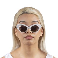 Roberi & Fraud’s retro-futurist sunglasses have quickly emerged as vital of-the-moment women’s accessories, making a strong case for the bygone decade’s return to aesthetic relevancy. Founded in 2017, it is the brainchild of self-taught New York/Dubai-based designers Ali Mehrdad and Stefan Foster. Pearlized acetate frame sunglasses. Tonal lenses with 100% UV protection. Size: 38.21 145. Acetate. Imported. Futuristic Cat Eye Sunglasses With Mirrored Lenses, Futuristic Cat Eye Sunglasses With Uv Protection, Retro Plastic Shield Sunglasses For Party, Futuristic Cat Eye Sunglasses With Tinted Lenses, Retro Glass Sunglasses, Modern Party Cat Eye Sunglasses With Mirrored Lenses, Retro Cat Eye Shield Sunglasses With Gradient Lenses, Evening Clear Sunglasses With Mirrored Lenses, Retro Plastic Cat Eye Sunglasses