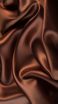 a close up view of a brown satin fabric