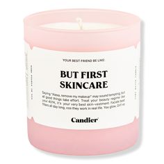 a pink candle that says, but first skin care