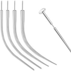 six stainless steel straws and two forks on a white background