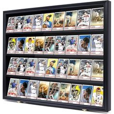 a baseball card display case with many different cards on the front and back shelves in black