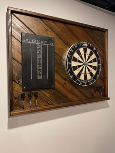 a dart board mounted to the side of a wall