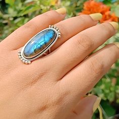 Handmade labradorite  bohemian ring  , you can wear this ring as a party wear ring .. Title -labradorite stone ring  Stone color - blue  Stone shape - oval Material - Sterling silver 925 Note - This is natural stone so shade may be little bit different .. we are giving you best quality rings on best price .. contact us for more quantity Bohemian Moonstone Crystal Ring For Healing, Blue Labradorite Bohemian Jewelry, Handmade Bohemian Oval Moonstone Ring, Bohemian Blue Labradorite Jewelry, Bohemian Open Ring Jewelry With Large Stone, Bohemian Open Ring With Large Stone, Handmade Bohemian Moonstone Crystal Ring, Bohemian Oval Moonstone Ring, Bohemian Gemstone Ring Jewelry