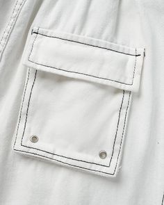 Details: White cargo pants with front drawstring and pockets designBottom Length: LongMaterials:75% Cotton + 25% Polyester White Cargo Pants With Cargo Pockets, White Wide-leg Cargo Jeans With Multiple Pockets, White Wide Leg Cargo Jeans With Multiple Pockets, White Cotton Pants With Cargo Pockets, White Cotton Pants With Multiple Pockets, Spring Cargo Jeans With Pockets, White Bottoms With Flap Pockets For Spring, White Utility Cargo Jeans With Pockets, White Baggy Cargo Pants With Hip Pockets