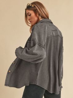 Say hello to your new favorite layering piece—The Chill Shacket! This isn’t just a button-down; it’s the wardrobe must-have you didn’t know you needed. With its sweatshirt and waffle knit fabric combo, raw edge seams, it give you that cozy lived-in look for an extra laid-back vibe. It's your new go-to! Pair it with any tee or tank, jeans or leggings, and you’ve got an effortless, comfy outfit that screams "I woke up like this!" Color: Charcoal Ladies Oversized Shacket, with a little bit of stret Trendy Oversized Washed Shacket, Fall Tops With Buttoned Pockets For Everyday, Relaxed Fit Outerwear With Buttons For Loungewear, Washed Long Sleeve Shacket For Fall, Trendy Washed Shacket For Fall, Trendy Oversized Outerwear With Button Cuffs, Everyday Washed Shacket, Long Sleeve Washed Shacket For Fall, Casual Everyday Washed Shacket