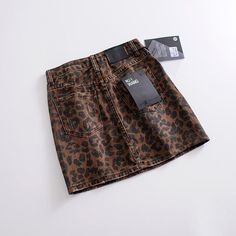 Gender: WOMENMaterial: COTTONMaterial: PolyesterStyle: Sexy & ClubPattern Type: LeopardSilhouette: PencilDecoration: NONEDresses Length: Above Knee, MiniWaistline: empireModel Number: LRRAA713 High Waist Leopard Print Skirt For Fall, Trendy High Waist Leopard Print Skirt, Trendy Fitted Leopard Print Skirt, Fitted Leopard Print Mini Bottoms, High Waist Stretch Leopard Print Skirt, Leopard Print Stretch Mini Skirt, Fall Leopard Print Fitted Mini Skirt, Leopard Print Mini Skirt For Fall, Stretch Mini Skirt In Leopard Print