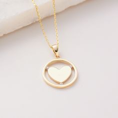 "Three Stone Personalized Heart, Past Present Future 3 Stone Pendant, Cz, 10K 14K 18K Solid Gold,  Minimalist Design Pendant Necklace, Jewelry for everyday wear  Sizes of the *Three Stone Hearts Pendant* * 0.70inch /  17mm (excluding bail) * 0.85inch /  22mm (including bail) * 100% 10K 14K 18K Solid Yellow Gold (Not Gold Vermail or Not Gold Plated) * 100% 14K  Solid Whte Gold (Not Gold Vermail or Not Gold Plated) * Price includes the chain when \"Pendant and Chain option\" is chosen. * Cubic Zirconia clear simulated diamonds *Three Stone Personalized Heart Pendant is a lightweight item. * Polished finish EU and UK taxes; *EU and UK orders over £135/€150 are subject to customs, import duties and tax charges once they reach their destination. This means that the recipient will be responsible Yellow Gold Heart Necklace For Valentine's Day, Yellow Gold Heart Necklace With Birthstone, Yellow Gold Heart Necklace For Wedding, Valentine's Day Yellow Gold Heart Necklace, 14k Gold Round Heart Necklace For Wedding, Mother's Day Yellow Gold Round Heart Necklace, 14k Gold Round Heart Necklace For Anniversary, 3 Stone Pendant, Minimalist Pendant