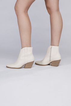 These booties are designed with a Western-inspired aesthetic, featuring classic details such as pointed toes, decorative stitching, and a stacked heel. They are typically ankle-high, making them suitable for various outfits, from jeans and dresses to skirts and shorts. The pointed toe adds a touch of sophistication, while the stacked heel offers comfort for extended wear. Style: Casual Silhouette: Booties Embellishment: NA Length: NA Closure: Zipper Heel Height: 3" Width: NA Made In: ChinaCare I Baseball Tops, Knee High Heels, Inspired Aesthetic, Zipper Heels, High Heel Boots Knee, Western Booties, Decorative Stitching, Dress Rings, And Dresses