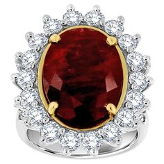 This one-of-a-kind ring features a rare un-heated natural 9.67 carat Red Ruby oval shape circled by eighteen (18) brilliant round diamonds and two rows of round diamond micro-prong set on a split shank band. The Ruby is deep red color and has some inclusions that blend nicely throughout the gem. The band is 2.8 mm wide. The Ruby is GIA certified. Certificate number 5211628195 The diamond's weight on the ring is 2.26 Carat. Average color G Average clarity SI1 size- 6.5 It can be resized to any fi Ruby Crown, African Inspired Jewelry, Royal Ruby, Real Diamond Necklace, Beautiful Tiaras, Split Shank, African Jewelry, Red Ruby, Ruby Diamond